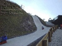 Racing down the luge track and this is the fast one.